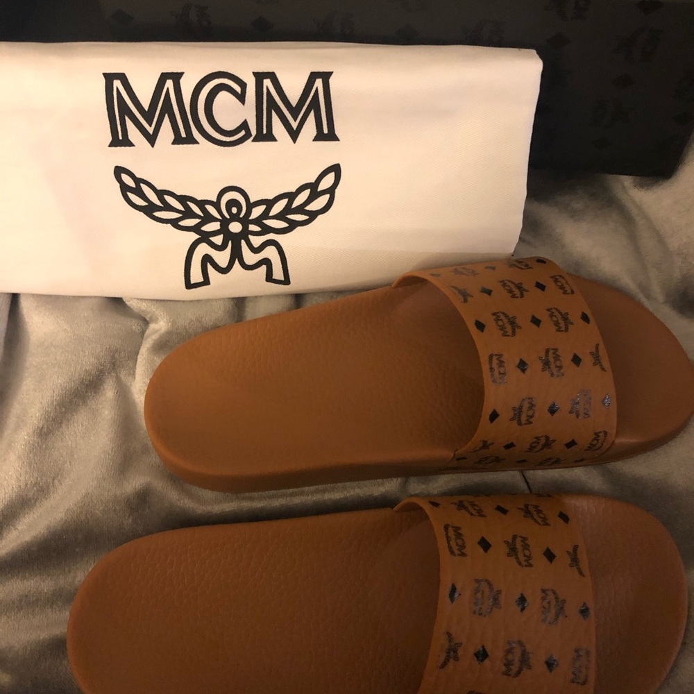 MCM women slides. ‘Like new’’. Fits like a 9.